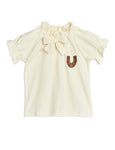 Mini Rodini Horseshoe Jersey Blouse | Off White - Green Hearts Pink